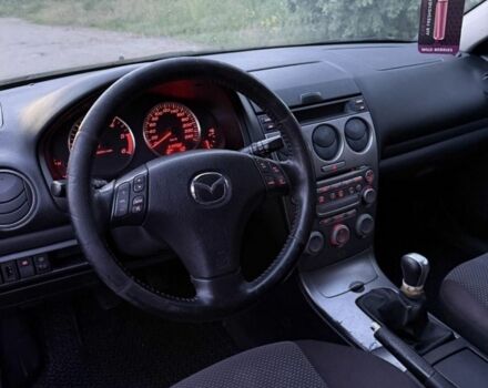 Черный Мазда 6, объемом двигателя 2 л и пробегом 315 тыс. км за 501 $, фото 1 на Automoto.ua