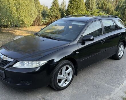 Черный Мазда 6, объемом двигателя 2 л и пробегом 300 тыс. км за 3299 $, фото 1 на Automoto.ua