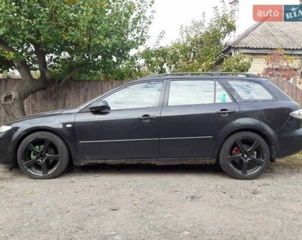 Черный Мазда 6, объемом двигателя 1.8 л и пробегом 206 тыс. км за 2500 $, фото 1 на Automoto.ua