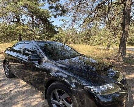Черный Мазда 6, объемом двигателя 2 л и пробегом 250 тыс. км за 6000 $, фото 1 на Automoto.ua