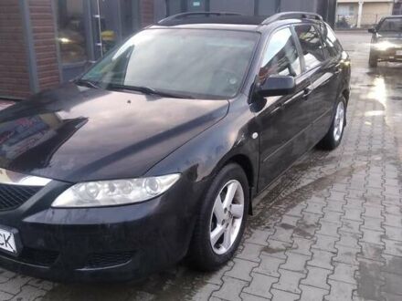 Черный Мазда 6, объемом двигателя 2 л и пробегом 250 тыс. км за 3800 $, фото 1 на Automoto.ua