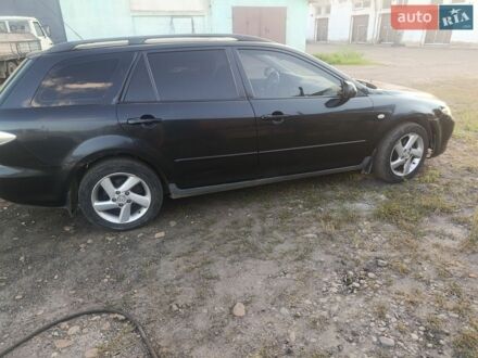 Черный Мазда 6, объемом двигателя 2 л и пробегом 280 тыс. км за 1700 $, фото 1 на Automoto.ua