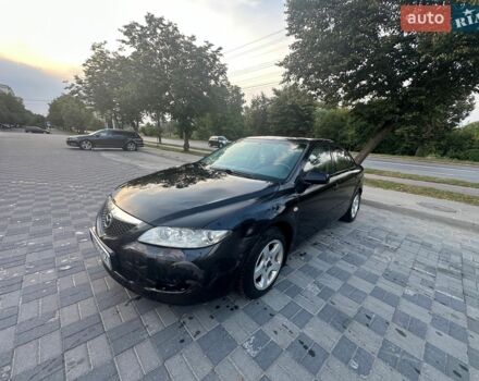 Черный Мазда 6, объемом двигателя 2 л и пробегом 373 тыс. км за 2200 $, фото 1 на Automoto.ua