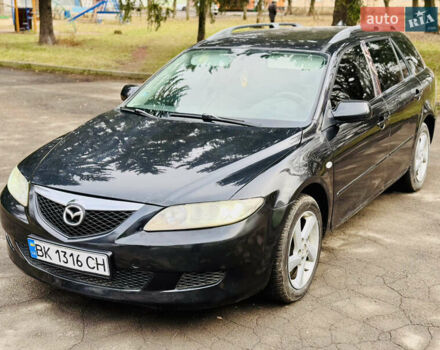 Черный Мазда 6, объемом двигателя 2 л и пробегом 350 тыс. км за 3000 $, фото 1 на Automoto.ua