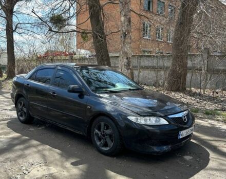 Черный Мазда 6, объемом двигателя 2 л и пробегом 250 тыс. км за 2150 $, фото 1 на Automoto.ua