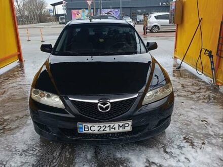 Черный Мазда 6, объемом двигателя 2 л и пробегом 314 тыс. км за 3800 $, фото 1 на Automoto.ua