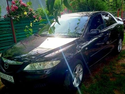 Черный Мазда 6, объемом двигателя 2 л и пробегом 280 тыс. км за 4500 $, фото 1 на Automoto.ua