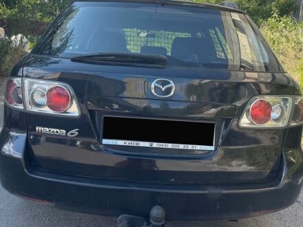 Чорний Мазда 6, об'ємом двигуна 2 л та пробігом 304 тис. км за 2750 $, фото 1 на Automoto.ua