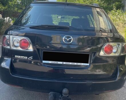 Черный Мазда 6, объемом двигателя 2 л и пробегом 304 тыс. км за 2750 $, фото 1 на Automoto.ua