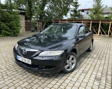 Черный Мазда 6, объемом двигателя 2 л и пробегом 300 тыс. км за 1950 $, фото 1 на Automoto.ua