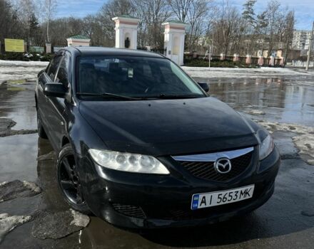 Черный Мазда 6, объемом двигателя 2 л и пробегом 300 тыс. км за 1900 $, фото 1 на Automoto.ua
