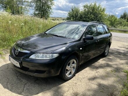 Чорний Мазда 6, об'ємом двигуна 1.8 л та пробігом 252 тис. км за 2300 $, фото 1 на Automoto.ua