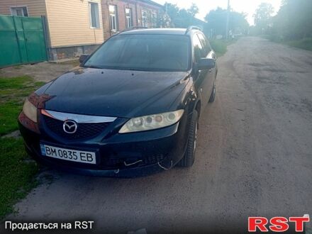 Черный Мазда 6, объемом двигателя 2 л и пробегом 268 тыс. км за 3000 $, фото 1 на Automoto.ua