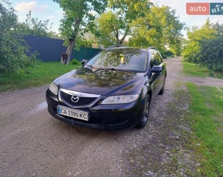 Черный Мазда 6, объемом двигателя 2 л и пробегом 416 тыс. км за 3800 $, фото 1 на Automoto.ua
