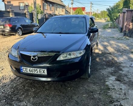 Черный Мазда 6, объемом двигателя 2 л и пробегом 200 тыс. км за 3800 $, фото 1 на Automoto.ua