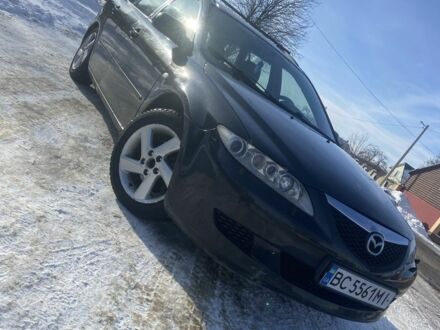Чорний Мазда 6, об'ємом двигуна 2 л та пробігом 247 тис. км за 3150 $, фото 1 на Automoto.ua