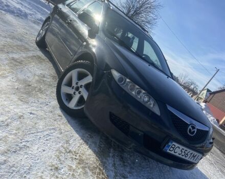 Черный Мазда 6, объемом двигателя 2 л и пробегом 247 тыс. км за 3150 $, фото 1 на Automoto.ua
