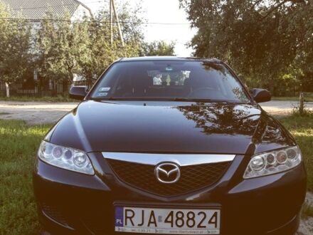 Черный Мазда 6, объемом двигателя 2 л и пробегом 269 тыс. км за 2950 $, фото 1 на Automoto.ua