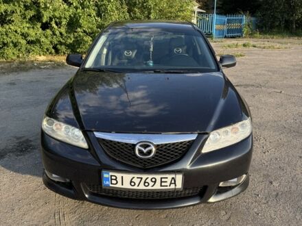 Чорний Мазда 6, об'ємом двигуна 2.3 л та пробігом 285 тис. км за 4800 $, фото 1 на Automoto.ua
