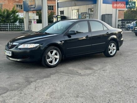 Чорний Мазда 6, об'ємом двигуна 2 л та пробігом 261 тис. км за 3750 $, фото 1 на Automoto.ua