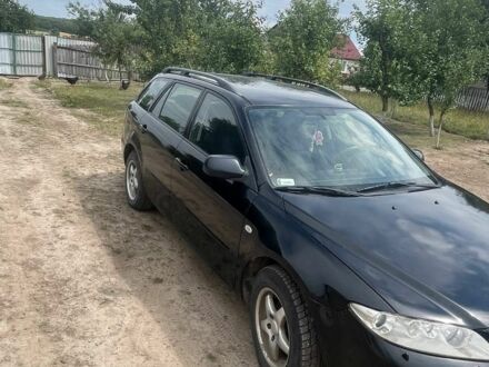 Чорний Мазда 6, об'ємом двигуна 2 л та пробігом 310 тис. км за 2300 $, фото 1 на Automoto.ua