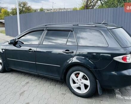 Черный Мазда 6, объемом двигателя 2 л и пробегом 330 тыс. км за 4750 $, фото 1 на Automoto.ua