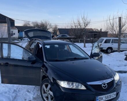 Черный Мазда 6, объемом двигателя 2 л и пробегом 390 тыс. км за 3450 $, фото 1 на Automoto.ua