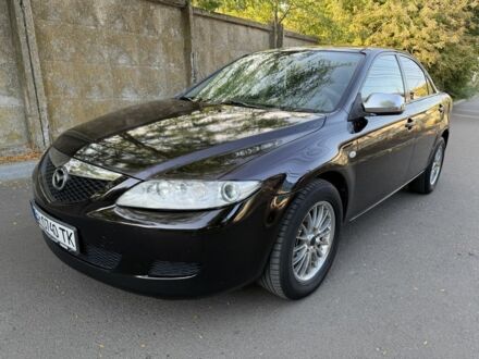 Чорний Мазда 6, об'ємом двигуна 1.8 л та пробігом 310 тис. км за 2601 $, фото 1 на Automoto.ua