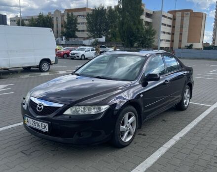 Черный Мазда 6, объемом двигателя 2 л и пробегом 240 тыс. км за 2600 $, фото 1 на Automoto.ua