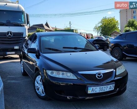 Черный Мазда 6, объемом двигателя 1.82 л и пробегом 356 тыс. км за 1550 $, фото 1 на Automoto.ua