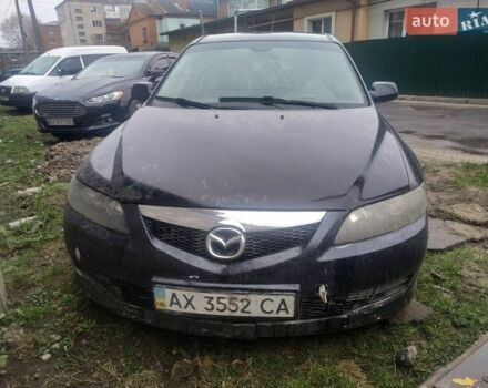 Черный Мазда 6, объемом двигателя 2 л и пробегом 357 тыс. км за 850 $, фото 1 на Automoto.ua