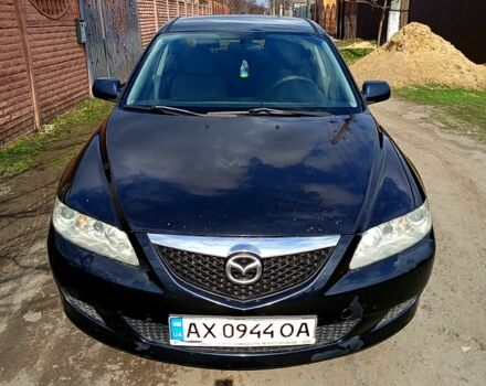 Черный Мазда 6, объемом двигателя 2 л и пробегом 300 тыс. км за 2850 $, фото 1 на Automoto.ua