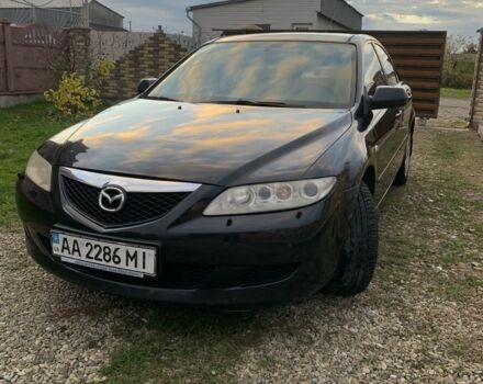Черный Мазда 6, объемом двигателя 2 л и пробегом 202 тыс. км за 4700 $, фото 1 на Automoto.ua