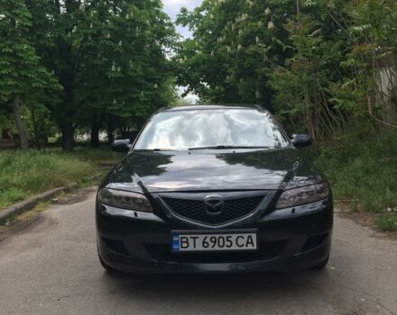 Черный Мазда 6, объемом двигателя 2 л и пробегом 237 тыс. км за 6300 $, фото 1 на Automoto.ua