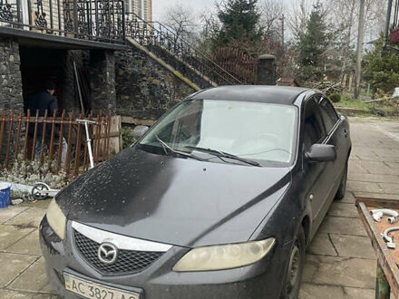 Черный Мазда 6, объемом двигателя 1.82 л и пробегом 450 тыс. км за 2900 $, фото 1 на Automoto.ua