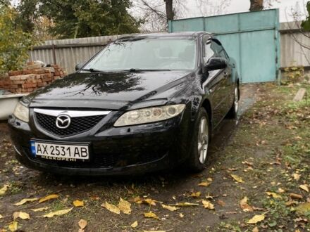 Чорний Мазда 6, об'ємом двигуна 2 л та пробігом 257 тис. км за 5500 $, фото 1 на Automoto.ua