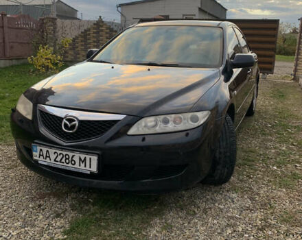 Черный Мазда 6, объемом двигателя 2 л и пробегом 202 тыс. км за 4700 $, фото 1 на Automoto.ua
