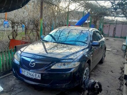 Черный Мазда 6, объемом двигателя 2 л и пробегом 250 тыс. км за 4200 $, фото 1 на Automoto.ua