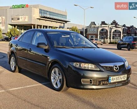 Черный Мазда 6, объемом двигателя 2 л и пробегом 233 тыс. км за 3200 $, фото 1 на Automoto.ua