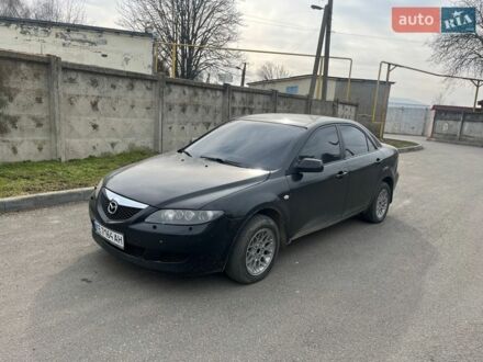 Чорний Мазда 6, об'ємом двигуна 2 л та пробігом 200 тис. км за 1750 $, фото 1 на Automoto.ua