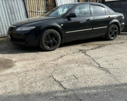 Черный Мазда 6, объемом двигателя 2 л и пробегом 215 тыс. км за 2850 $, фото 1 на Automoto.ua