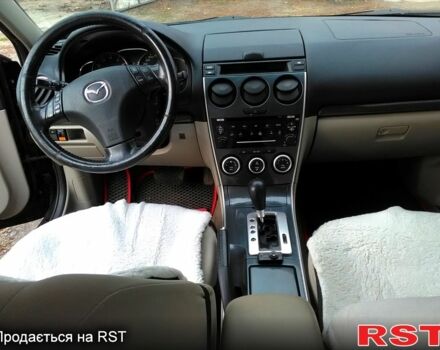 Чорний Мазда 6, об'ємом двигуна 2 л та пробігом 241 тис. км за 4100 $, фото 1 на Automoto.ua