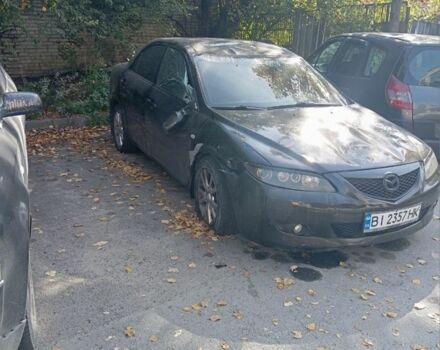Черный Мазда 6, объемом двигателя 2 л и пробегом 250 тыс. км за 1601 $, фото 1 на Automoto.ua