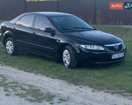 Черный Мазда 6, объемом двигателя 1.82 л и пробегом 300 тыс. км за 2150 $, фото 1 на Automoto.ua