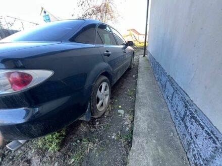 Черный Мазда 6, объемом двигателя 2 л и пробегом 220 тыс. км за 2200 $, фото 1 на Automoto.ua