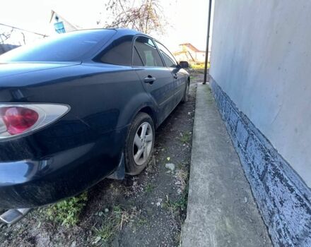 Черный Мазда 6, объемом двигателя 2 л и пробегом 220 тыс. км за 2200 $, фото 1 на Automoto.ua