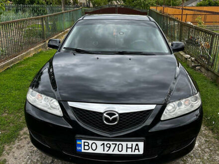 Черный Мазда 6, объемом двигателя 1.8 л и пробегом 210 тыс. км за 4500 $, фото 1 на Automoto.ua