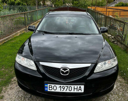 Черный Мазда 6, объемом двигателя 1.8 л и пробегом 210 тыс. км за 4500 $, фото 1 на Automoto.ua