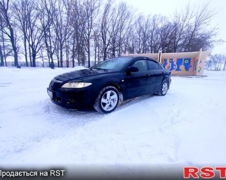 Черный Мазда 6, объемом двигателя 2 л и пробегом 260 тыс. км за 4550 $, фото 1 на Automoto.ua