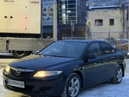 Черный Мазда 6, объемом двигателя 2 л и пробегом 250 тыс. км за 2700 $, фото 1 на Automoto.ua
